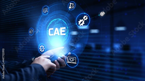 CAE Computer-aided engineering software system concept. Businessman pressing button on screen. photo