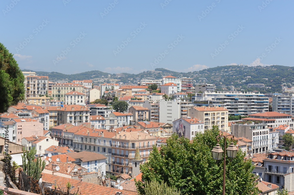 Panorama of Cannes harbour with yachts at Mediterranean Sea in summer on a sunny day