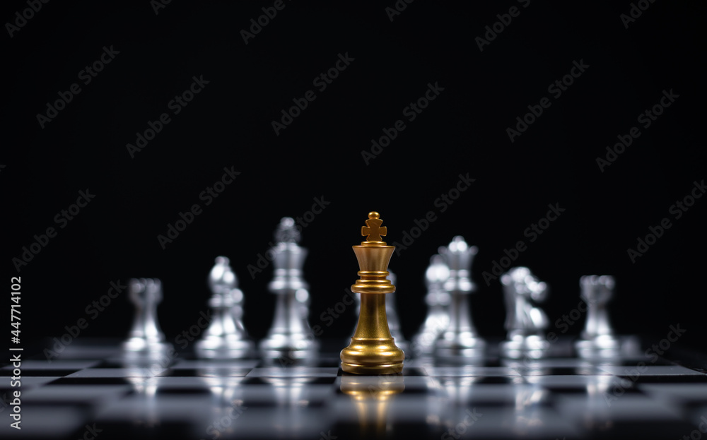 Chess board game between silver team and golden team is stategy game as business challange competitive game ,this business stategy plan concept. Chess board game between silver team and golden team is stategy game as business challange competitive game ,this business stategy plan concept.