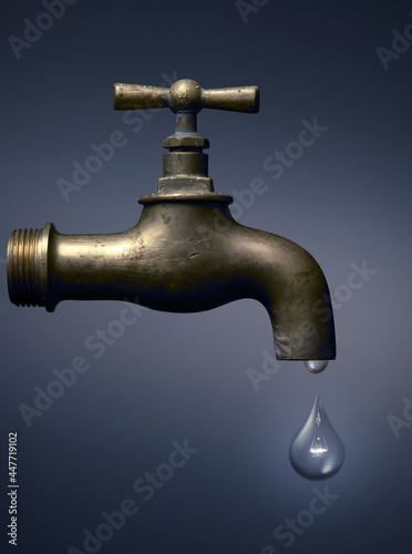 faucet with a light bulb-shaped drop, ecology concept for water and energy.

