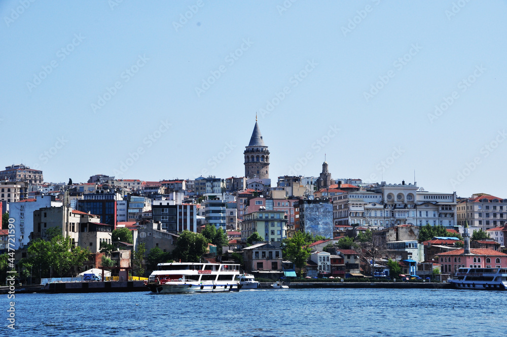 Panoramic view of Istanbul and Galata tower from the strait. 09 July 2021, Istanbul, Turkey.