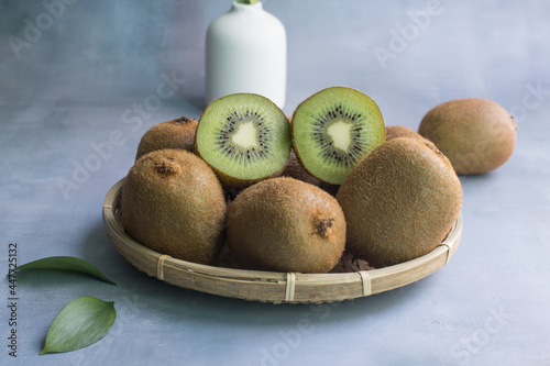 fresh cut green kiwi fruit isolated on white.