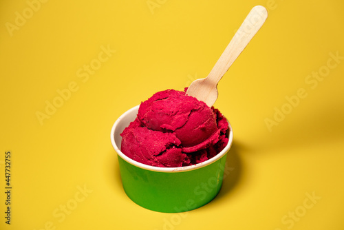 Deep Red Berry Sorbet Yellow Background Green Cup High Angle