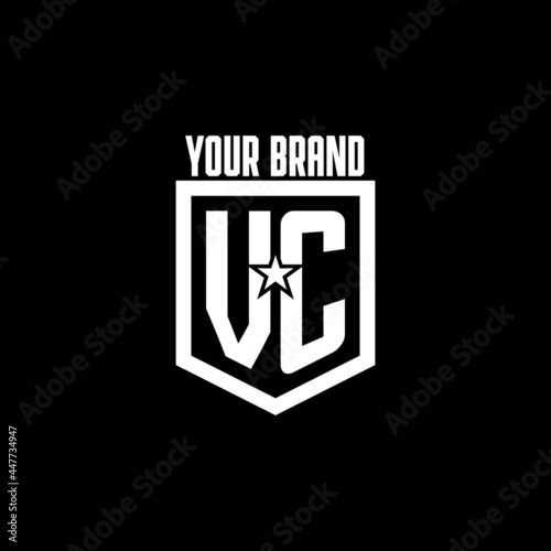 VC initial gaming logo with shield and star style design