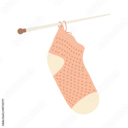 Knitted sock with needles