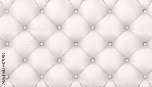 tufted white leather background.