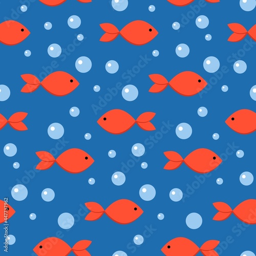 Cute seamless pattern with minimalistic red fishes and bubbles on dark blue backgruond. Designed for nursery room
