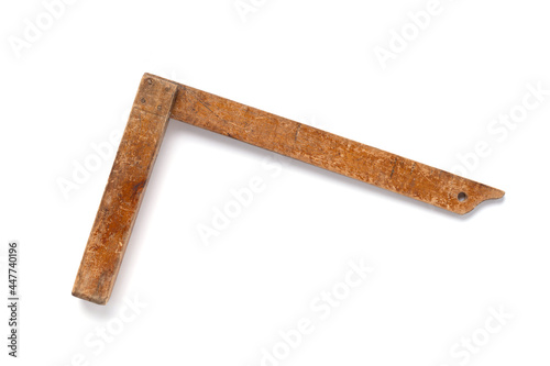 Wooden setsquare tool for worker isolated on white background photo
