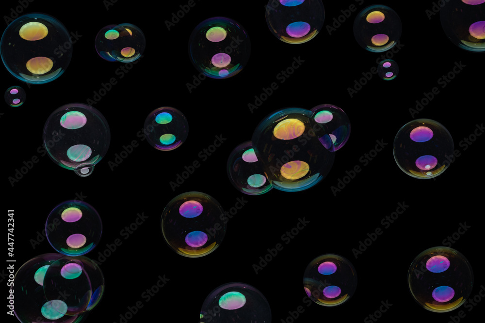 Various soap bubbles on a black background. space and universe