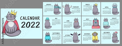 Vector calendar for 2022 on blue background with cartoon gray cats. A set of funny cats for every month. 