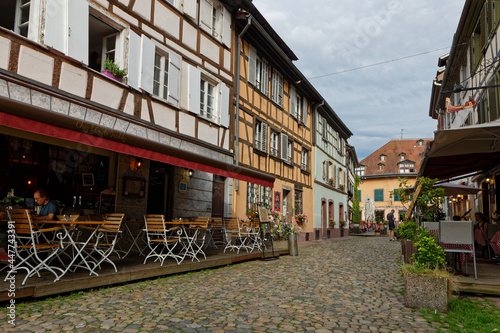 STRASBOURG, FRANCE, June 23, 2021 : A touristic street in Petite France quarter, home in the Middle Ages to the city's tanners, and now a main tourist attraction.