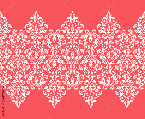 Wallpaper in the style of Baroque. Seamless vector background. White and pink floral ornament. Graphic pattern for fabric, wallpaper, packaging. Ornate Damask flower ornament