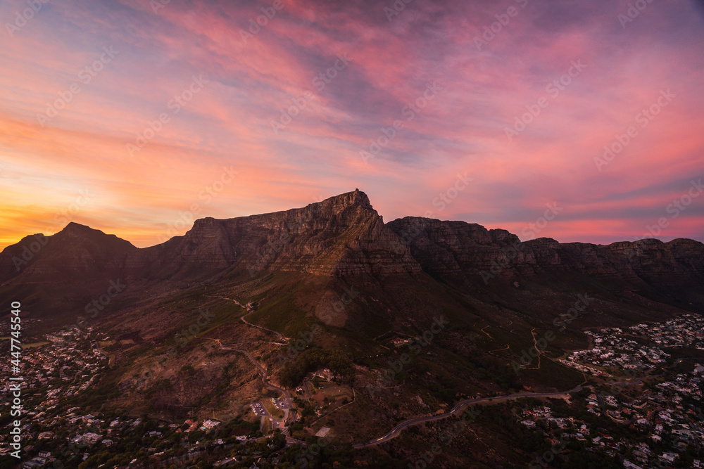 View of Table Mountain from Lion's head during a dramatic sunset in Cape Town, South Africa. View of Table Mountain from Lion's head during a dramatic sunset in Cape Town, South Africa.