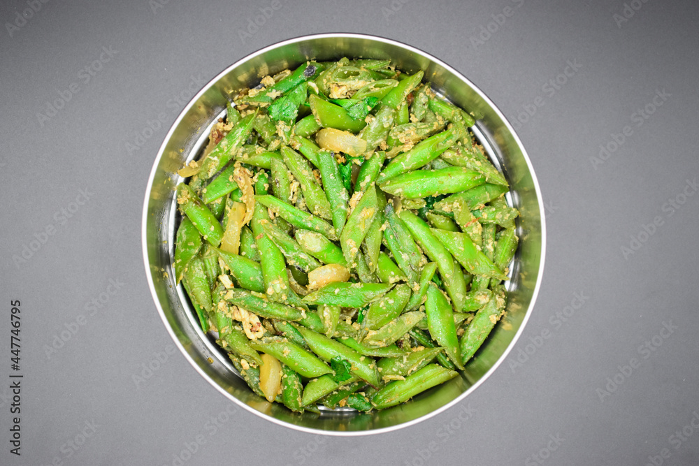 Asian, Myanmar or Burmese green bean curry recipe. Top view. Asian, Myanmar or Burmese green bean curry recipe. Top view.