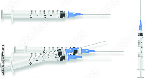 blue syringe on white