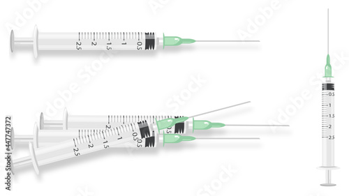 green syringe on white