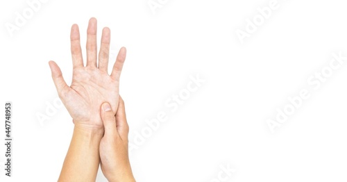 Asian young man holding his hand. Concept of tendon problems and hand health
