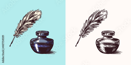 Ink and feather and inkwell in vintage engraved style. Retro vector illustration for woodcut or woodblock or print. Hand drawn. photo