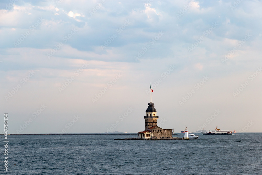 Maiden Tower (kiz kulesi) in Istanbul in the evening with cloudy sky.