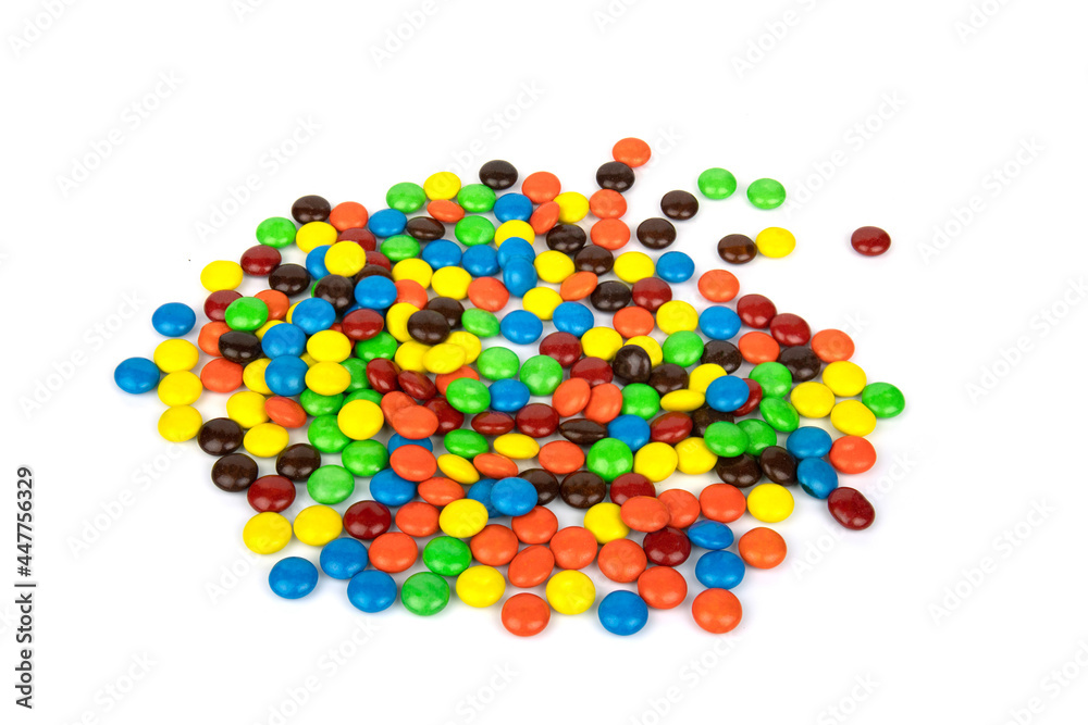 Colorful chocolate in and out of focus on white background. Colorful chocolate in and out of focus on white background.