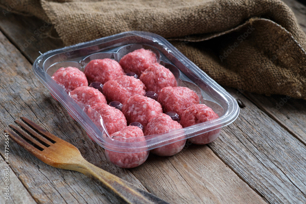 Raw meatballs made from ground beef Raw meatballs made from ground beef