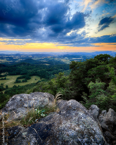 Beautiful sunset and clouds in Rudawy Janowickie (Mountains in south-west Poland, Europe). View from Krzyzna Gora (654 m above sea level) in the middle of July. photo