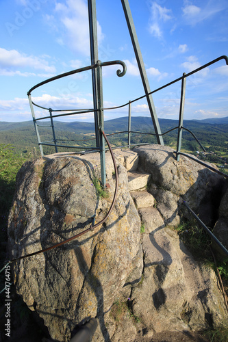 Krzyzna Gora (654 m above sea level) in the area of Rudawy Janowickie (Mountains in south-west Poland, Europe). There are steps carved in the rock to the top (black trail). photo