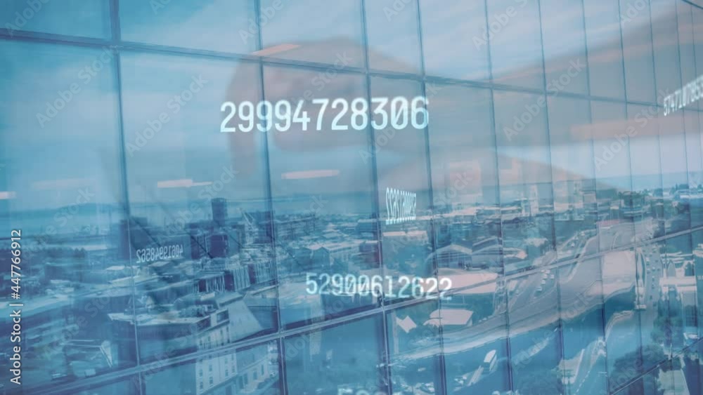 Multiple increasing numbers over mid section of person using laptop against cityscape Multiple increasing numbers over mid section of person using laptop against cityscape