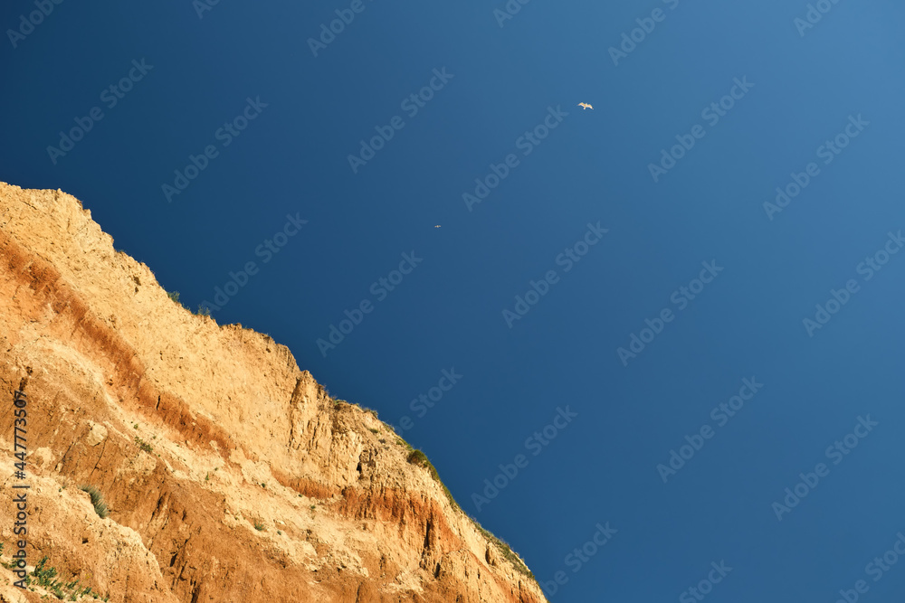 Beautiful landscape, sandy cliff over the sea. Beautiful landscape, sandy cliff over the sea.