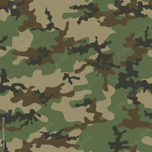 Green camouflage texture, military uniform, disguise. Classic shape texture.