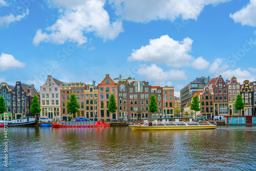 Amsterdam, The Netherlands 23th June 2021 -Taxi boar filled with tourists waiting to sail off on the Amstel River in Amsterdam during summer