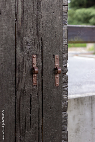 rustic wooden door with antique latch
