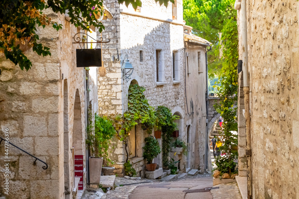Shops and art galleries line the narrow cobblestone roads in the medieval hilltop village of St Paul de Vance on the French Riviera.