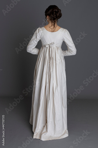 A Regency woman wearing a printed cotton dress photo
