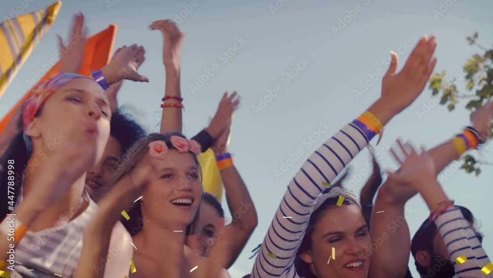 Animation of gold confetti falling over happy people clapping outdoors Animation of gold confetti falling over happy people clapping outdoors