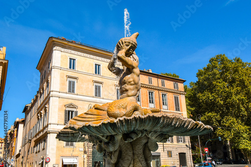 Photography Close up of the Triton Fountain in the Piazza Barberini, by Gian Lorenzo Bernini, a masterpiece of Baroque sculpture in the historic center of Rome