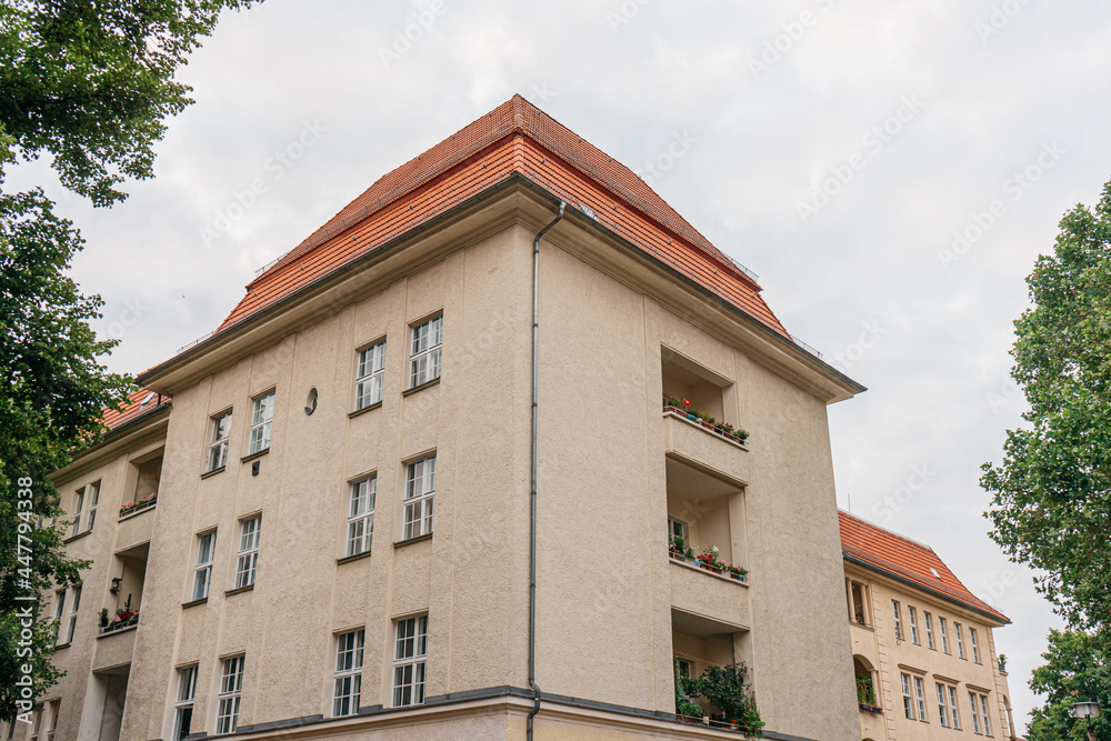 ddr apartment house with red rooftop