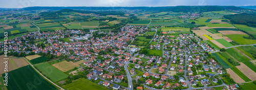 Aerial view of the city Eggolsheim in Germany, on a cloudy day in spring.