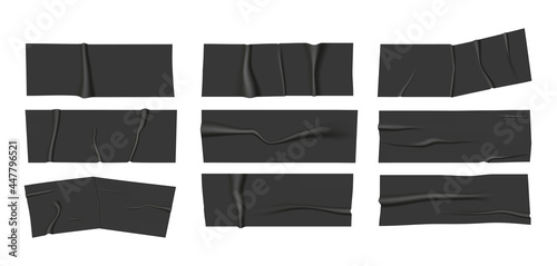 Realistic wrinkled black adhesive tape. Vector scotch pieces. photo