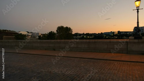 Twilight view of the Queen Victoria Bridge, a road bridge across the River Dee in Aberdeen, Scotland, UK opened in 1881 photo