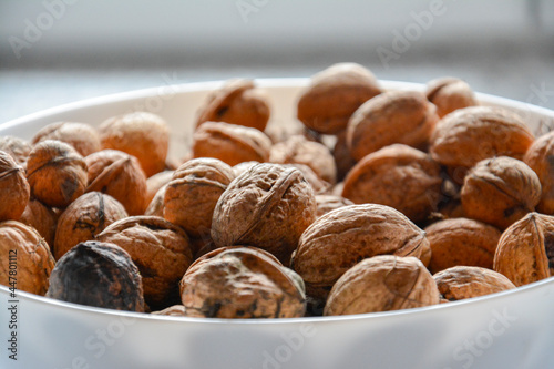 nuts in a bowl walnut halzelnut chestnut food serve snack