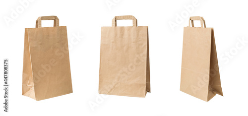 Three large paper bags with handles isolated on a white background.