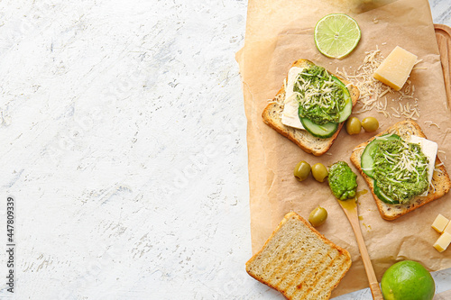 Tasty toasts with pesto sau...
