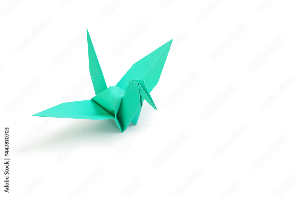 Naklejka premium Origami crane isolated over white studio background. Image with Clipping path and copy space