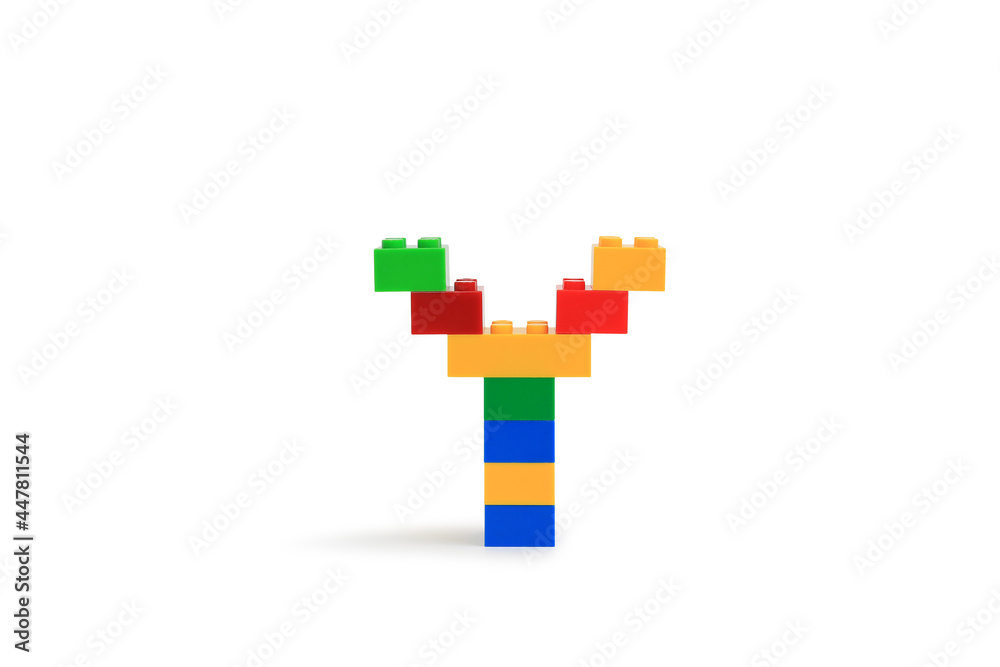 Alphabet letters Y from colorful plastic brick block constructor isolated on white background. Image with Clipping path Alphabet letters Y from colorful plastic brick block constructor isolated on white background. Image with Clipping path