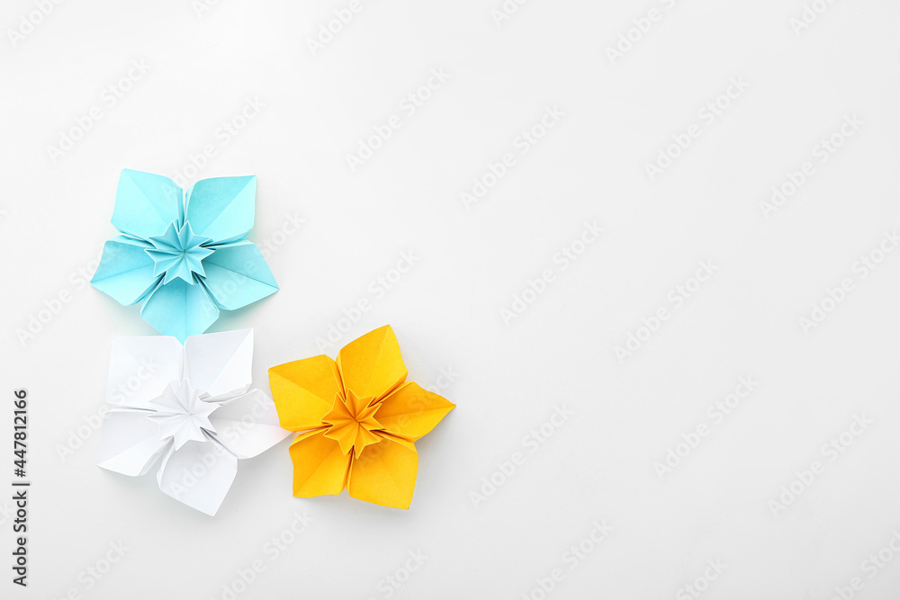 Origami daffodils on white background Origami daffodils on white background