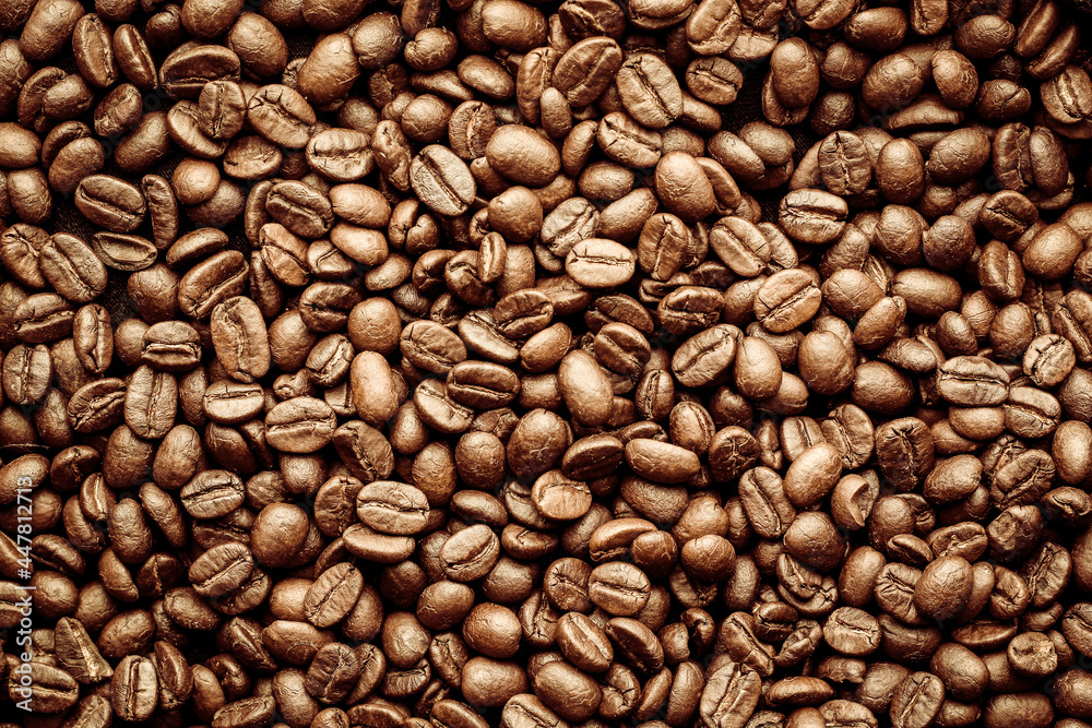 Naklejka premium Roasted Coffee Beans background texture.