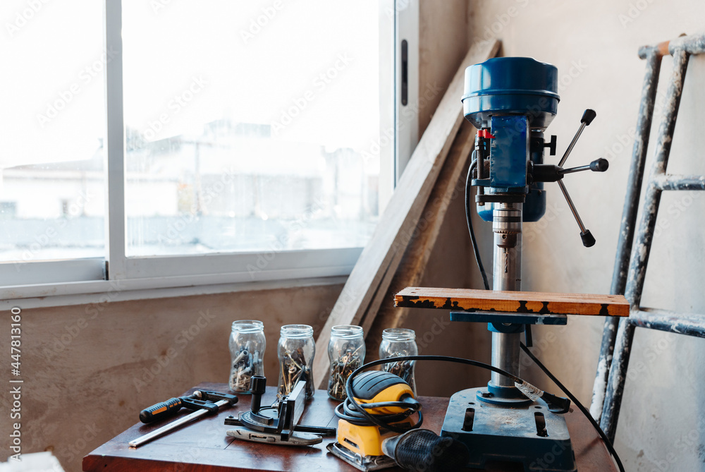 workspace of a carpenter indoors with machines workspace of a carpenter indoors with machines