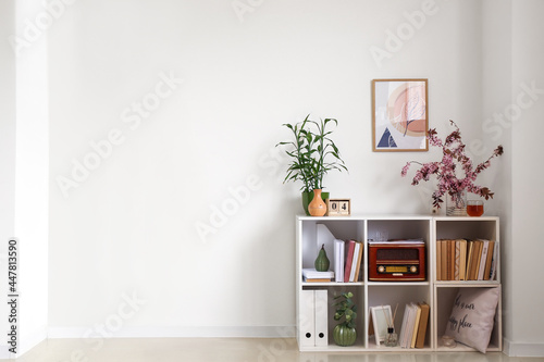 Shelf unit with blossoming ...