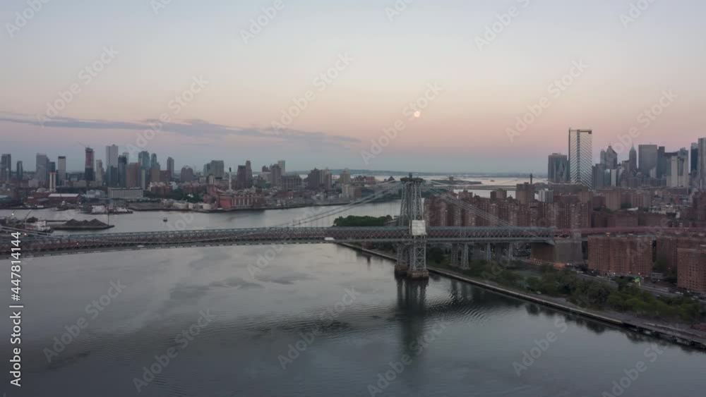 Full moon set over East river Full moon set over East river